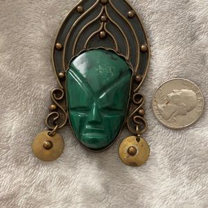 Vintage green carved face necklace